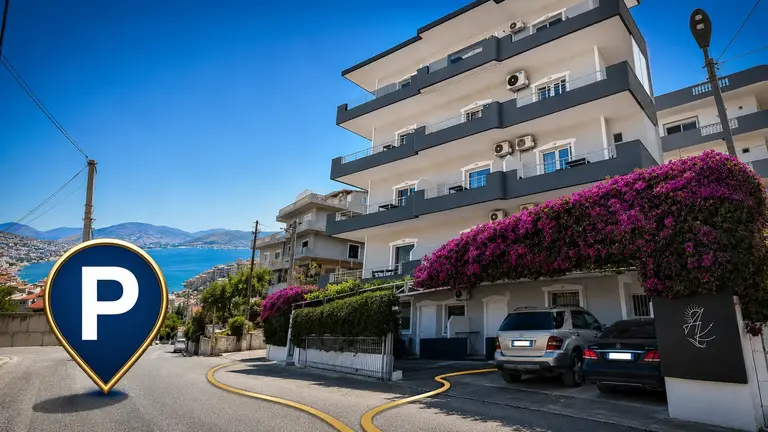 Apartments Klajdi exterior with a parking marker and route