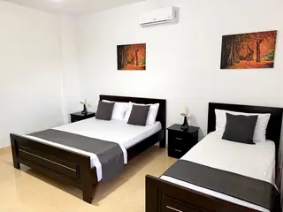 Wide interior view of the Double Room with Garden View — thumbnail