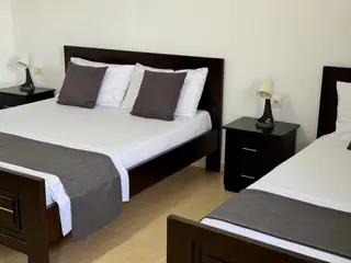 Prepared beds inside the Double Room with Garden View — thumbnail
